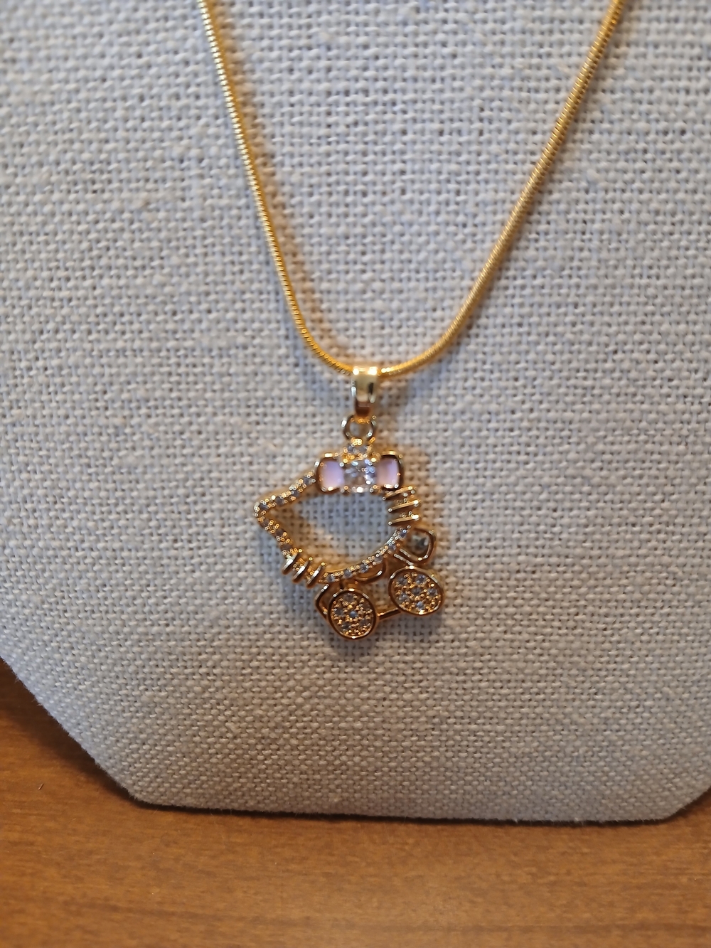 Gold-Tone HELLO KITTY Pendant Necklace with Pink Accents